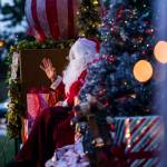 Santa Claus waves goodbye from his festive float during the socially distanced meet-up hosted by Maryfest on Thursday in Marysville. (Olivia Vanni / The Herald)