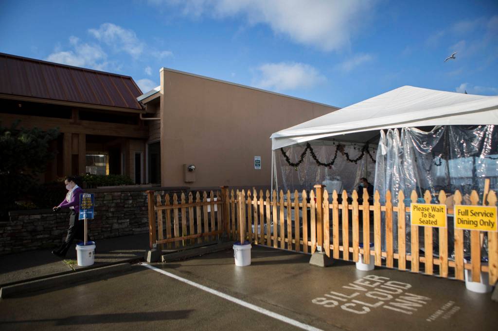 People dine outdoors as Ivars on Wednesday in Mukilteo. (Olivia Vanni / The Herald)