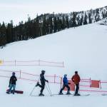 People wait in line for lifts to open at Stevens Pass last Friday. (Olivia Vanni / The Herald)