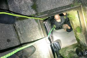 A man allegedly involved in a burglary fled law enforcement and hid in a stormwater pond retention pipe Monday in Lake Stevens. Deputies found and arrested him. (Snohomish County Sheriff's Office)