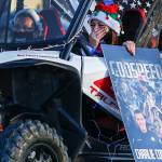 Christina Parker (right) and Roxanne Mitchell participate in a memorial parade for missing Tulalip officer Charlie Cortez Saturday afternoon on the Tulalip Reservation. (Kevin Clark / The Herald)