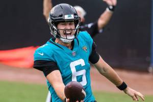 Jacksonville Jaguars quarterback Jake Luton (6) in the end zone celebrating his rushing touchdown during the second half of an NFL football game against the Houston Texans, Sunday, Nov. 8, 2020, in Jacksonville, Fla. (AP Photo/Gary McCullough)