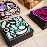 Lu Hernandez created these four small mixed-media pieces with acrylic and alcohol ink. (Olivia Vanni / The Herald)