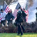 Supporters of President Donald Trump and antifa supporters clashed with Washington state police on the state Capitol Campus in Olympia on Saturday. (The Olympian via AP)