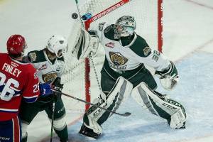 Everett Silvertips' Dustin Wolf blocks a shot during the game on Sunday, Jan. 26, 2020 in Everett, Wash. (Olivia Vanni / The Herald)