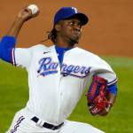 File-This Sept. 9, 2020, file photo shows Texas Rangers relief pitcher Rafael Montero throwing to the Los Angeles Angels in a baseball game in Arlington, Texas. The Seattle Mariners bolstered their bullpen on Tuesday by acquiring right-handed reliever Montero from the Rangers.  (AP Photo/Tony Gutierrez, File)
