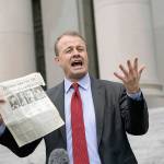 Initiative promoter Tim Eyman talks to reporters Oct. 15 in front of the Temple of Justice at the Capitol in Olympia. (AP Photo/Ted S. Warren, file)