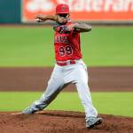 Angels relief pitcher Keynan Middleton (99) throws against the Astros during a game Aug. 24, 2020, in Houston. (AP Photo/Michael Wyke)