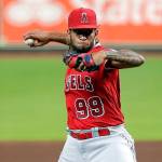 Los Angeles Angels relief pitcher Keynan Middleton (99) throws against the Houston Astros during a baseball game Monday, Aug. 24, 2020, in Houston. (AP Photo/Michael Wyke)