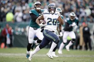 Seattle Seahawks' Rashaad Penny (20) runs for a touchdown during the second half of an NFL football game against the Philadelphia Eagles, Sunday, Nov. 24, 2019, in Philadelphia. (AP Photo/Matt Rourke)
