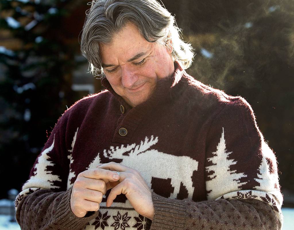 Kevin Klein and his found wedding ring. (Kevin Clark / The Herald)