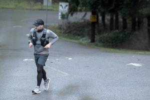 Wes Plate make this way up the hill into Forest Park on Sunday, Dec. 20, 2020 in Everett, Wa. (Olivia Vanni / The Herald)