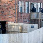 FBI and ATF agents investigate a home Saturday, Dec. 26, 2020, in Nashville, Tenn. An explosion that shook the largely deserted streets of downtown Nashville early Christmas morning shattered windows, damaged buildings, and wounded three people. Authorities said they believed the blast was intentional. (AP Photo/Mark Humphrey)