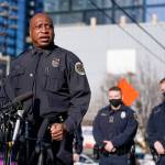 Nashville Chief of Police John Drake speaks at a news conference Sunday, Dec. 27, 2020, in Nashville, Tenn. Drake spoke before five officers told what they experienced when an explosion took place in downtown Nashville early Christmas morning. The officers are part of a group of six officers credited with evacuating people before the explosion happened. Behind Drake are two of the officers, Michael Sipos, center, and Richard Luellen, right. (AP Photo/Mark Humphrey)