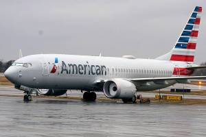 FILE - In this Dec. 2, 2020 file photo, an American Airlines Boeing 737 Max jet plane is parked at a maintenance facility in Tulsa, Okla.  Paying passengers were scheduled to board a Boeing 737 Max in Miami on Tuesday, Dec. 29 for the first time since safety regulators allowed the plane to fly again after two deadly crashes.
The American Airlines flight is scheduled to land at New York’s LaGuardia Airport with about 100 passengers aboard, according to an airline spokeswoman. (AP Photo/LM Otero, File)