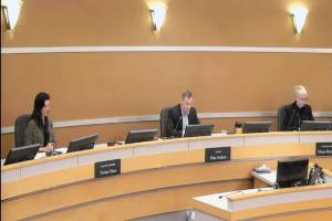 Council member Vivian Olson (left), Mayor Mike Nelson (center) and council member Diane Buckshnis practiced social distancing at the Edmonds City Council meeting Tuesday. (City of Edmonds)
