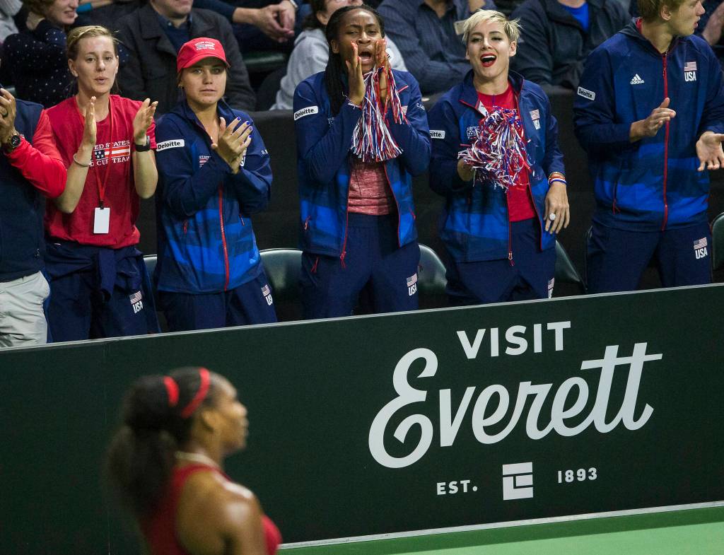 Team USA cheers on Serena Williams from their seats during a Fed Cup match against Latvia on Feb. 7, 2020, at Angel of the Winds Arena in Everett. (Olivia Vanni / The Herald)