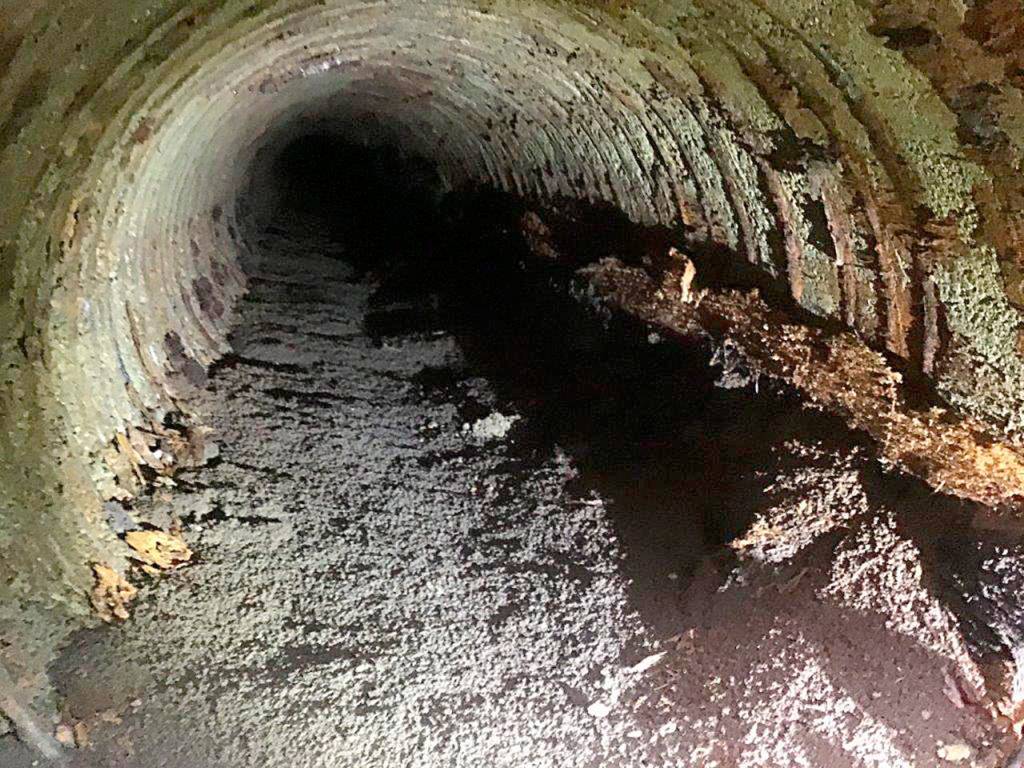 The Rucker Renewal utilities and road project ended up almost $2 million over the original budget because crews found unexpected conditions, including a void from deteriorated wood water pipes that had to be removed and filled. (City of Everett)