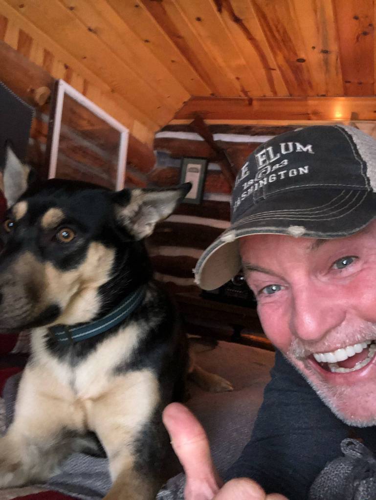 KIRO radio host John Curley of The Tom and Curley Show with Luu, a shepherd mix he adopted from PAWS in Lynnwood. (John Curley)