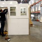 Weatherstripping is installed Thursday afternoon at Pallet in Everett on January 21, 2020. (Kevin Clark/The Herald)