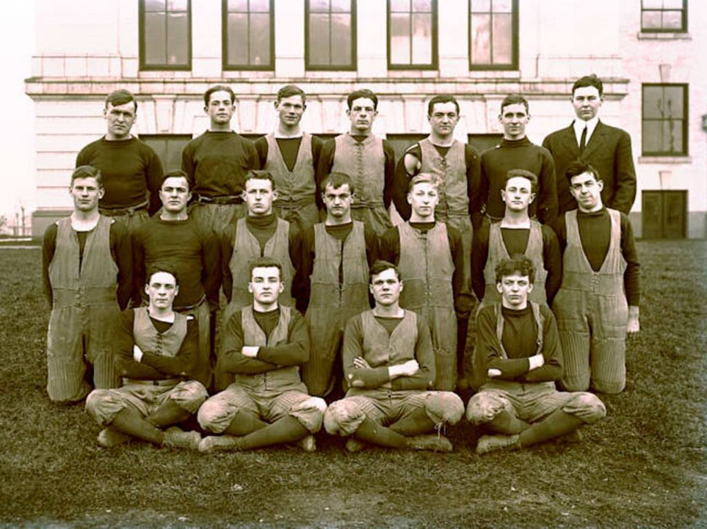 The 1912 Everett football team. Back row: Coach Bagshaw; Zene Maulsby; Irwin Dailey; Larry Jones; Dan Michel; Assistant Coach Elbridge Fifield; Manager Spencer Armstrong. Middle row: Clarence Zimmerman; William Guerin; Raymond Shumway; Walter Kuhnle; Bert Brooks; Pete Lee; Kenneth Herrett. Front row: Walter Menzel; Fiske Phelan; William Carlson;Lloyd Stoddard. (Everett Public Library Northwest History Room)