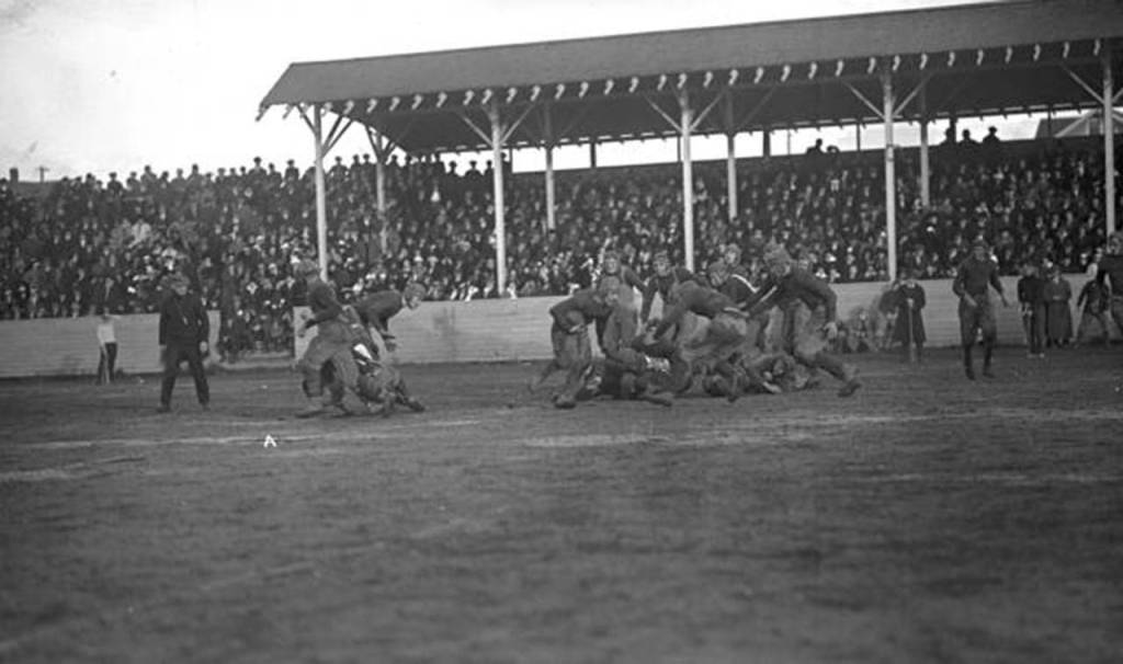 The Everett football team plays a 1914 game at Athletic Field in Everett. (Everett Public Library Northwest History Room)