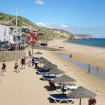Salema's fishermen share their beach with travelers.