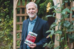 William McClain, author of "The Risk in Crossing Borders", at his home on Wednesday, Sept. 16, 2020 in Lynnwood, Wa. (Olivia Vanni / The Herald)