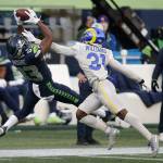 Seattle Seahawks wide receiver David Moore (83) makes a catch in front of Los Angeles Rams cornerback Darious Williams (31) during the second half of an NFL football game, Sunday, Dec. 27, 2020, in Seattle. (AP Photo/Scott Eklund)