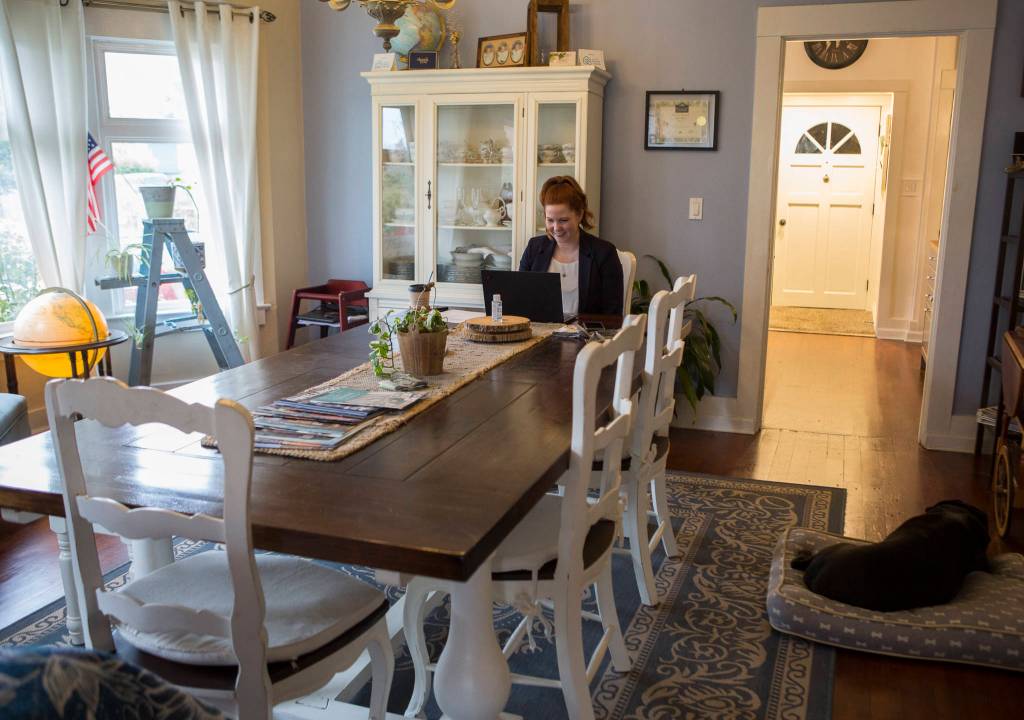 State Rep. Emily Wicks joins her online swearing-in ceremony from her home on Friday in Everett. (Olivia Vanni / The Herald)