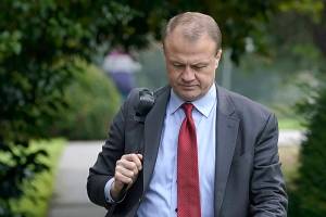 Initiative promoter Tim Eyman arrives to talk to reporters, Thursday, Oct. 15, 2020, at the Capitol in Olympia, Wash. The Washington Supreme Court on Thursday unanimously struck down Eyman's Initiative 976, a measure that would have steeply discounted the price of car registrations at $30 while gutting transportation budgets across Washington state. (AP Photo/Ted S. Warren)