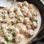 Swedish meatballs are served in a rich, roux-based gravy made with beef broth, heavy cream and sour cream. Cranberry sauce adds a bright and tangy garnish. (Gretchen McKay)