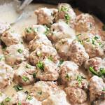 Roasted Swedish meatballs are served in a rich, roux-based gravy made with beef broth, heavy cream and sour cream. Cranberry sauce adds a bright and tangy garnish. (Gretchen McKay/Pittsburgh Post-Gazette/TNS)