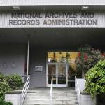 This Jan. 23, 2020, photo shows the National Archives on Sand Point, Wash., that has about a million boxes of generally unique, original source documents and public records. More than two dozen Native American tribes and cultural groups from the Northwest and Alaska are suing the federal government to stop the sale of the National Archives building in Seattle, a plan that would force the relocation of millions of invaluable historical records to California and Missouri. (Alan Berner/The Seattle Times via AP)