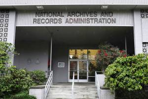 This Jan. 23, 2020, photo shows the National Archives on Sand Point, Wash., that has about a million boxes of generally unique, original source documents and public records. More than two dozen Native American tribes and cultural groups from the Northwest and Alaska are suing the federal government to stop the sale of the National Archives building in Seattle, a plan that would force the relocation of millions of invaluable historical records to California and Missouri. (Alan Berner/The Seattle Times via AP)