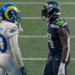 Rams defensive back Jalen Ramsey (left) and Seahawks wide receiver DK Metcalf engage between plays during a game Dec. 27, 2020, in Seattle. (AP Photo/Stephen Brashear)