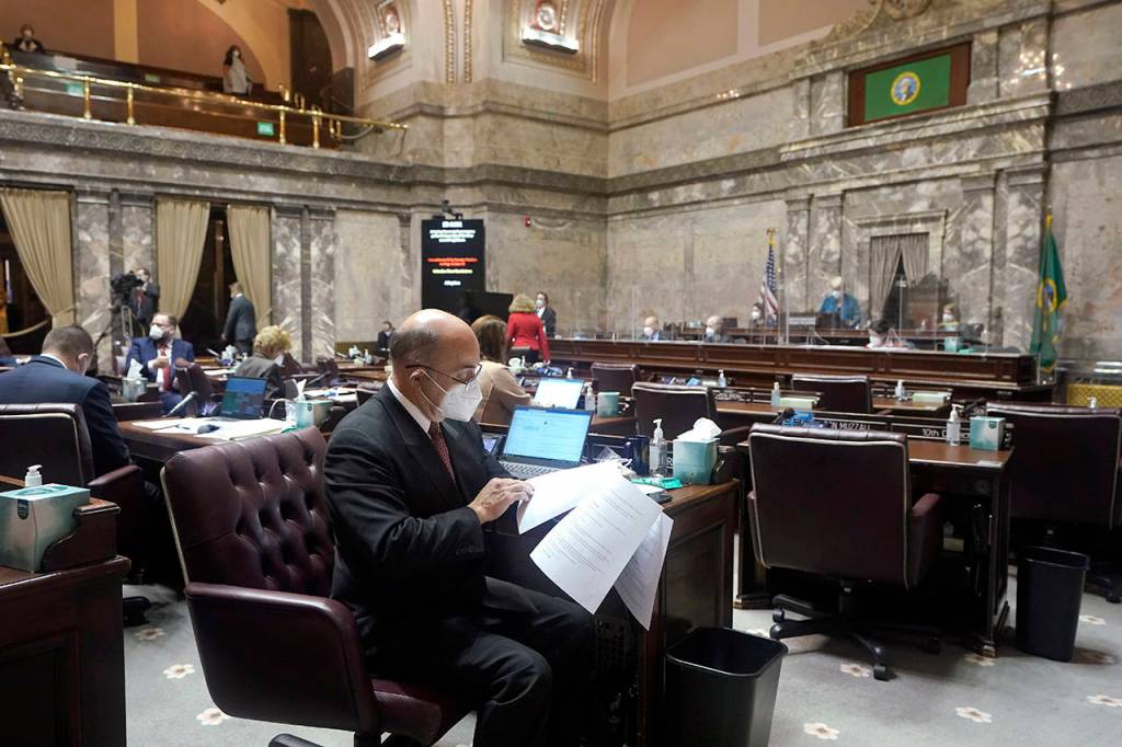 Sen. Keith Wagoner, R-Sedro-Woolley, sits at his desk on the Senate floor Monday at the Capitol in Olympia. (AP Photo/Ted S. Warren)