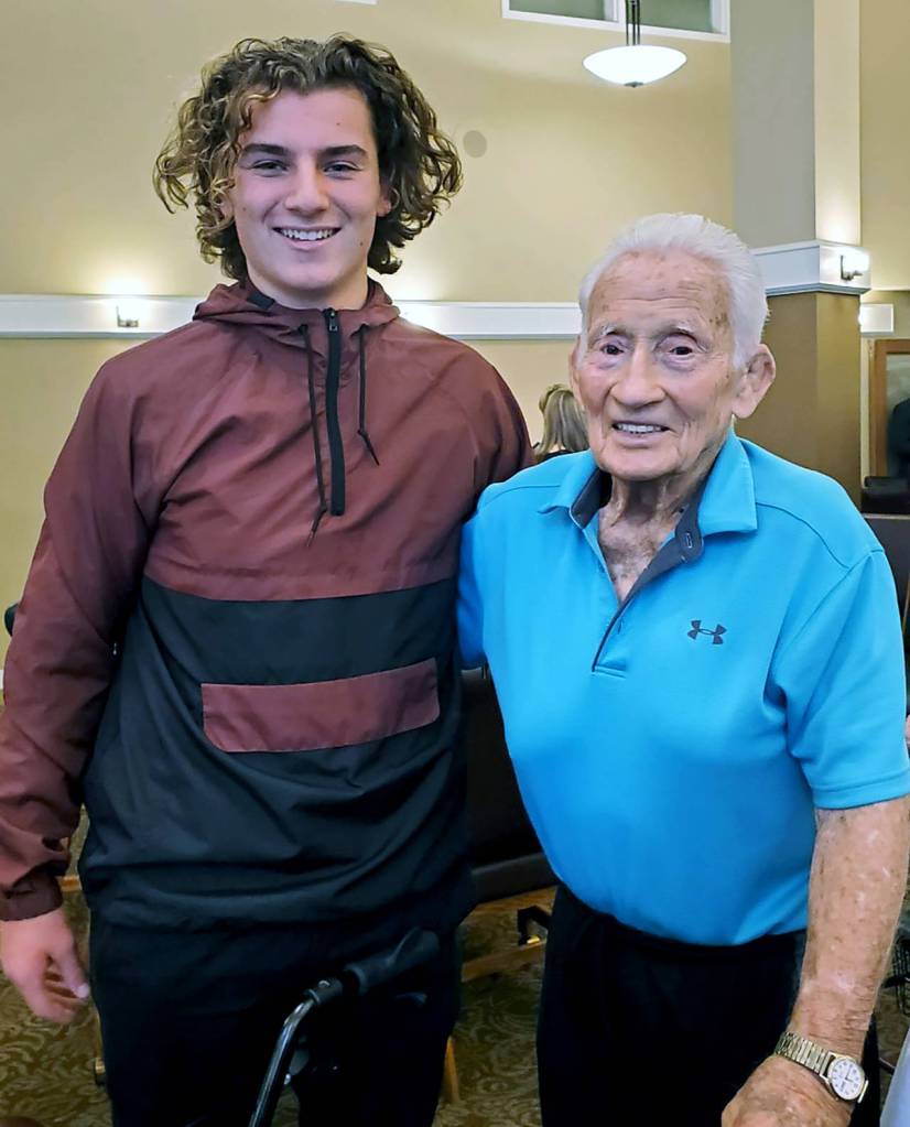 Dick Cardinal (right) with former Lakewood High School graduate, football and baseball standout Riley Krueger. (Lakewood School District)