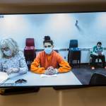 Dominic Wilson, one of the two teen suspects charged as adults in the murder of Andre Hofland, appears over video at his arraignment at the Snohomish County Courthouse on Tuesday in Everett. (Olivia Vanni / The Herald)