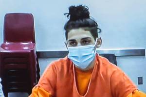 Dominic Wilson, one of the two teen suspects charged as adults in the murder of Andre Hofland, appears over video at his arraignment at the Snohomish County Courthouse on Tuesday, Jan. 12, 2020 in Everett, Wa. (Olivia Vanni / The Herald)