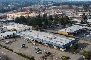 The strip-mall site (bottom) where Trent Development hopes to build 350 studio, one-bedroom and two-bedroom apartments, on Wednesday, Jan. 20, 2020 in Lynnwood, Wa. (Olivia Vanni / The Herald)