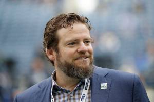 Seattle Seahawks general manager John Schneider walks on the field during warmups before an NFL football game against the Los Angeles Rams, Thursday, Oct. 3, 2019, in Seattle. The Seahawks have agreed to a contract extension with general manager John Schneider that will keep him tied to the franchise through the 2027 draft. The Seahawks announced Schneider’s extension on Tuesday, Jan. 12, 2021, three days after their season ended in a 30-20 loss to the Los Angeles Rams in the NFC wild-card playoff game. (AP Photo/Elaine Thompson)