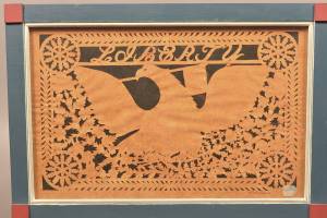 Scherenschnitte is a special type of German paper cutting art, and old and new examples are both seen at auctions. This modern example sold for just $40. (Cowles Syndicate Inc.)
