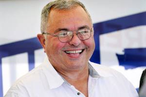 Republican gubernatorial candidate Loren Culp smiles while greeting supporters at a rally Saturday, Aug. 29, 2020, in Mount Vernon, Wash. Culp, police chief of the town of Republic, Wash., is running against incumbent Democratic Gov. Jay Inslee in November. (AP Photo/Elaine Thompson)