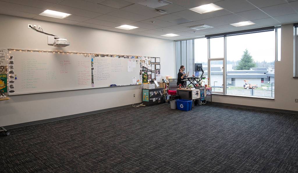 Jennifer Benton teaches an English class in her nearly empty room at the new Stanwood High School. (Andy Bronson / The Herald)