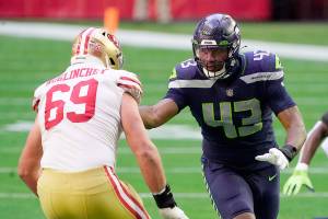 Seattle Seahawks defensive end Carlos Dunlap (43) during an NFL football game against the San Francisco 49ers, Sunday, Jan. 3, 2021, in Glendale, Ariz. (AP Photo/Rick Scuteri)