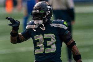Seattle Seahawks defensive back Jamal Adams gestures during warmups before an NFL wild-card playoff football game against the Los Angeles Rams, Saturday, Jan. 9, 2021, in Seattle. The Rams won 30-20. (AP Photo/Stephen Brashear)