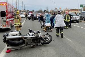 The scene on U.S. 2 in Monroe where a police officer on a motorcycle was struck by a motorist Tuesday. (Washington State Patrol) 20210127