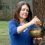 Gail Kronberg plays a Tibetan singing bowl. The practice of sound therapy can have healing and soothing effects for listeners. Kronberg is one of many holistic healers who call Whidbey home. Photo by Kira Erickson/Whidbey News Group