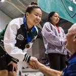 Jacksons Mia Chang receives her first place medal for the 200-yard IM during the Class 4A Girls State Swim and Dive Championship on Nov. 16, 2019, in Federal Way. (Olivia Vanni / The Herald)